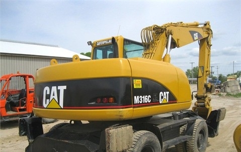 Caterpillar M316C de segunda mano a la venta Ref.: 1389028468831011 No. 2