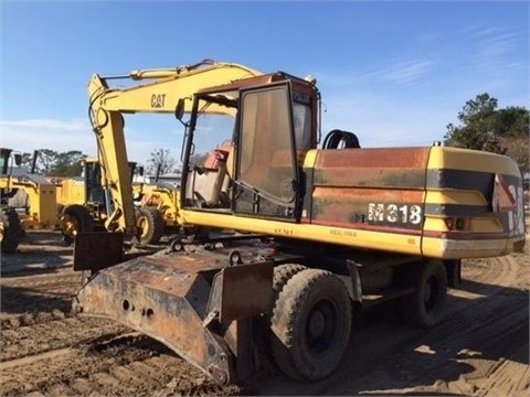 Excavadora Sobre Ruedas Caterpillar M318 de segunda mano a la ven Ref.: 1437837546284624 No. 2