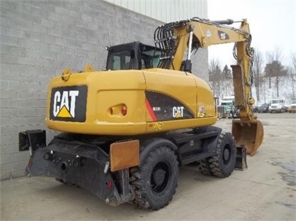 Excavadora Sobre Ruedas Caterpillar M313D seminueva en perfecto e Ref.: 1479143069488225 No. 2